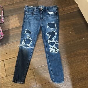 Women's Distressed Blue Jeans
